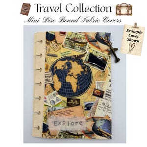 May include: A mini disc bound fabric cover featuring a vintage travel theme with a globe, maps, and postcards. The cover includes a small metal airplane charm and a fabric label with the text Explore. The design is printed in shades of yellow, blue, and tan.