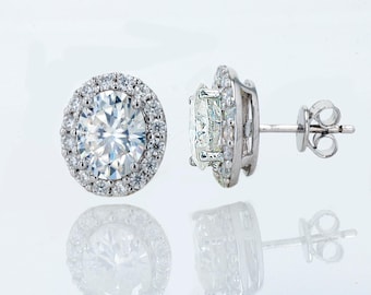 Moissanite Halo Earrings: Rhodium Over Sterling Silver D Color VVS Studs