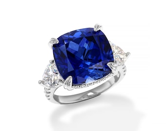 Large Blue Sapphire Stone Heart Side Stones: Lab Grown Stones Rhodium over Sterling Silver