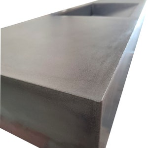 Concrete sink with ramp
