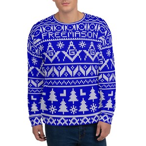 May include: Blue and white Christmas sweater with a Fair Isle pattern featuring the word "FREEMASON" and Masonic symbols.