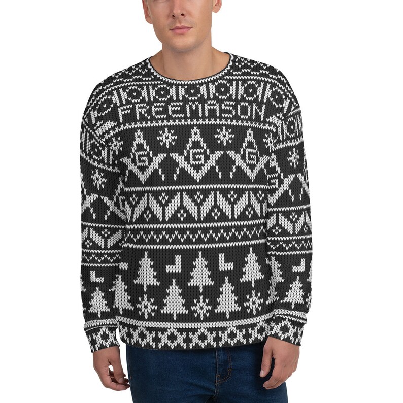 May include: Black and white Christmas sweater with a repeating pattern of snowflakes, pine trees, and the word "FREEMASON".