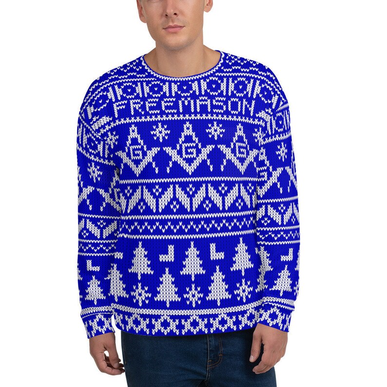 May include: Blue and white Christmas sweater with a Fair Isle pattern featuring the word "FREEMASON" and Masonic symbols.