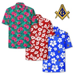 May include: Three short-sleeved button-down shirts with floral patterns. One is teal with pink flowers, another is red with white flowers, and the third is blue with white flowers. A Masonic symbol is in the upper right corner.