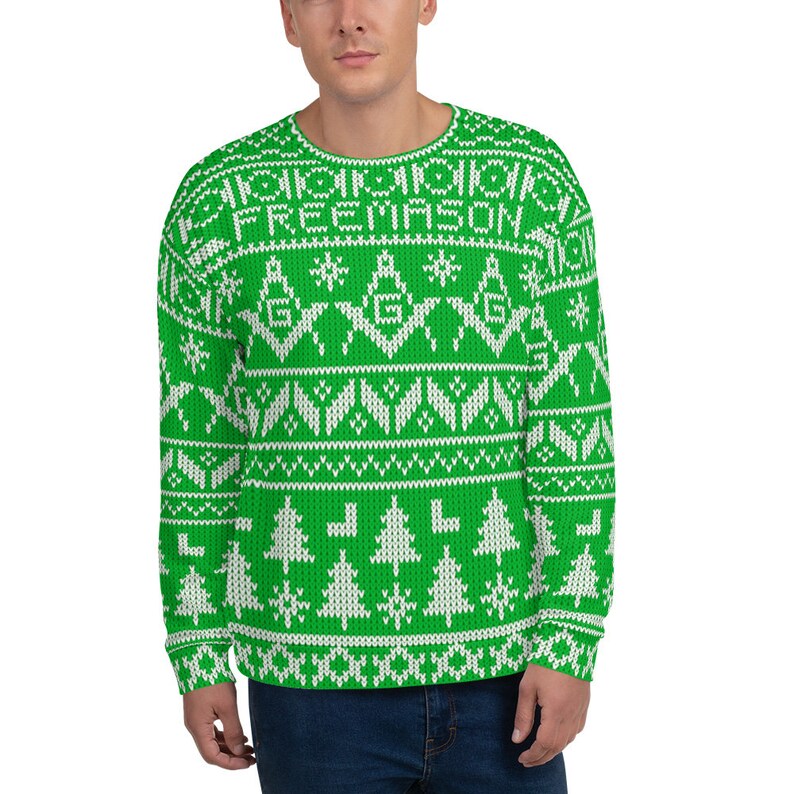 May include: Green and white Christmas sweater with a festive pattern and the text "FREEMASON".