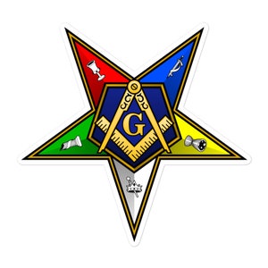 May include: A five-pointed star with a blue centre featuring a gold compass and the letter "G". The star is divided into five sections, each with a different colour and symbol: red with a chalice, blue with a sword, green with a column, yellow with a plumb bob, and white with a crown.