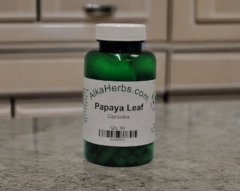 May include: A green bottle of Papaya Leaf capsules with a white label that reads "AlkaHerbs.com Papaya Leaf Capsules Qty. 90 ALKA633310".