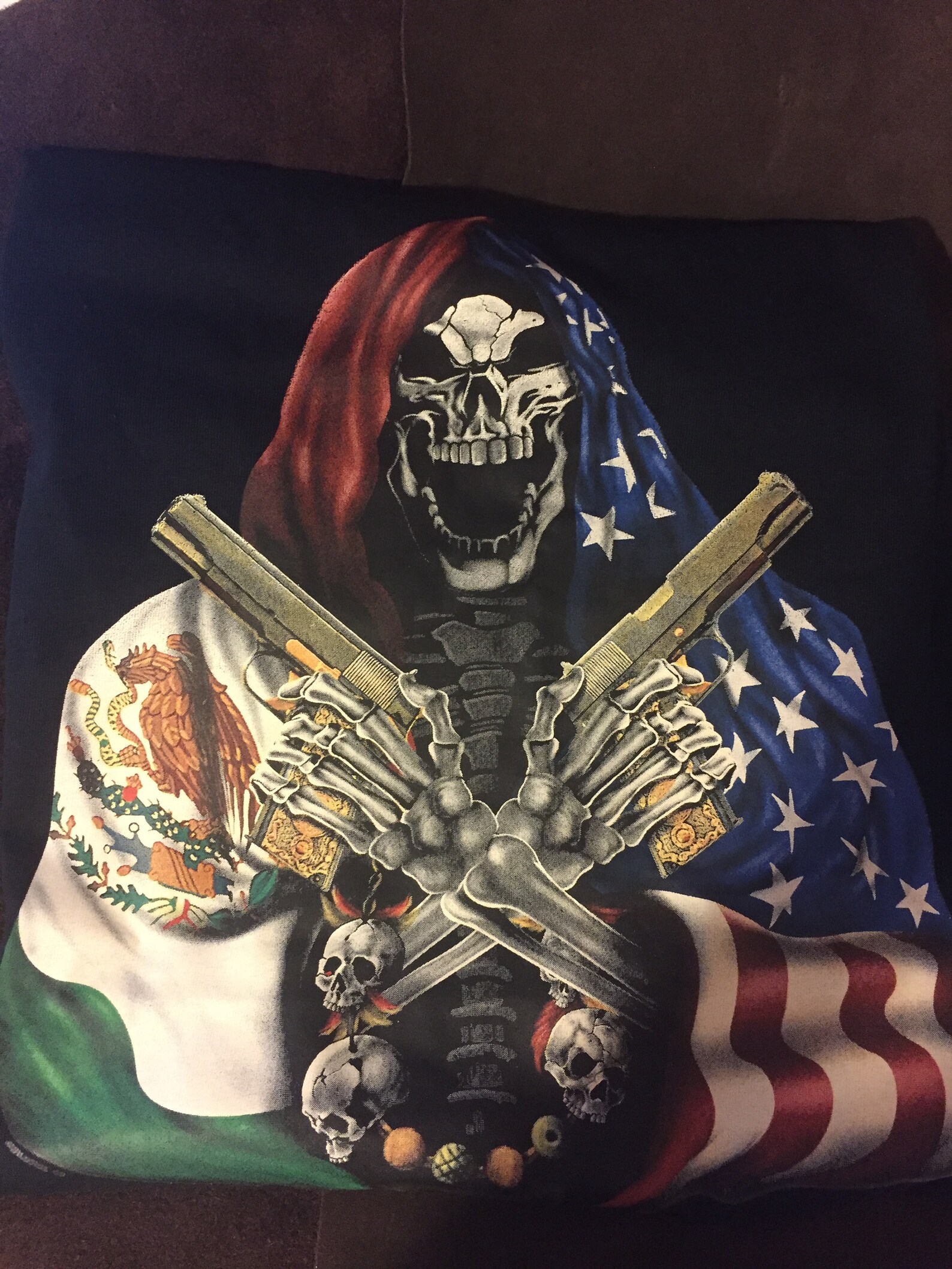 Black Skull With American Flag and Mexican Flag Holding Guns T Shirt