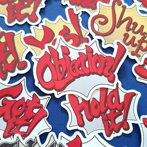 Op Ace Attorney geïnspireerde stickersets: bezwaar! Tekstballonnen: stickersets, Ace Attorney-spellen en Chronicles