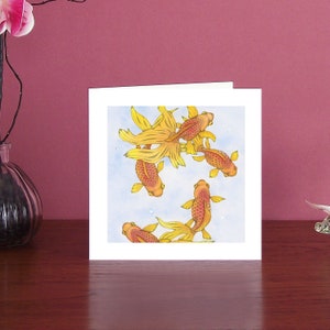 Charming and colourful fish illustration art card showing five fantailed fish.