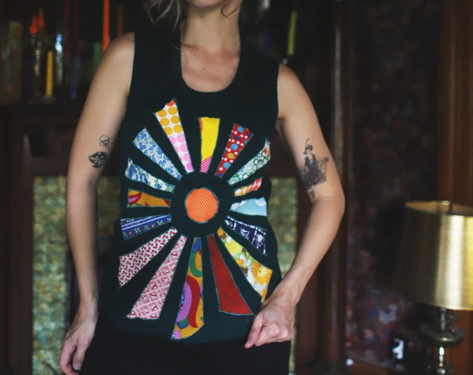 Featured listing image: Vintage 1960s 70s sleeveless forest green sweater vest handmade sunburst applique xs small