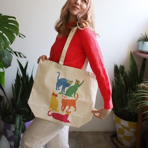 Flower power ear tipped cat tote bag