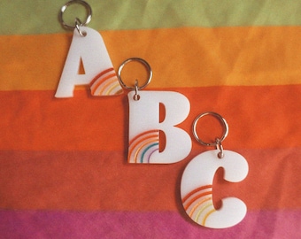 Handcrafted laser cut acrylic initial keychain - retro 1970s stripe inspired rainbow - customizable / personalized