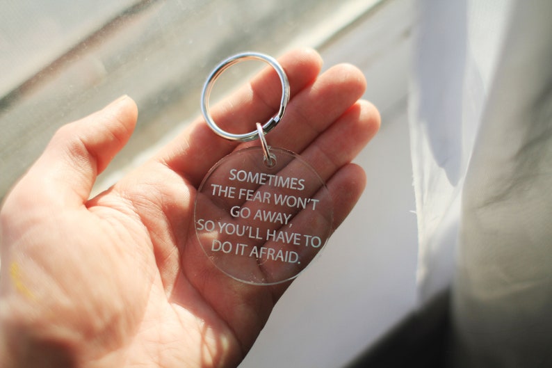 sometimes the fear won/'t go away so you/'ll have to do it afraid quote Handcrafted laser cut clear glass green acrylic keychain