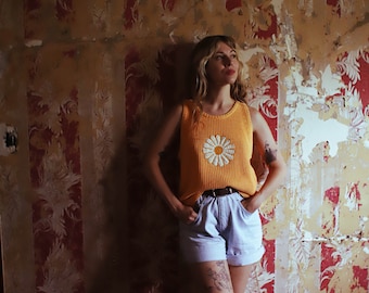 Sleeveless peachy orange flower applique tank top