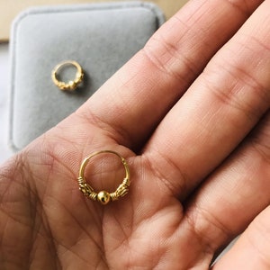 Ganpati Collection MENS Earing Kaju Bali Shaped Gold Plated Metal Hoop  Earring 1 PairGold Color