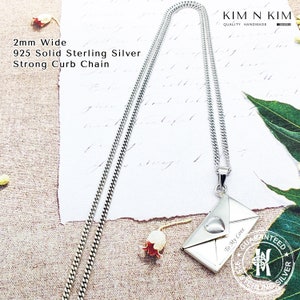 May include: A silver necklace with a 2mm wide curb chain and a silver pendant shaped like an envelope with a heart on the front. The pendant has the text "To My Love" engraved on it. The necklace is handmade and comes with a guarantee of quality.