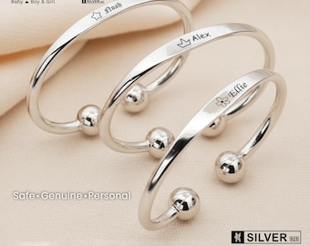 ミニマリストなスターリングシルバーの琥珀バングル｜洗練されたノット