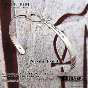 May include: A silver adjustable cuff bangle featuring an Ankh symbol and the inscription "Luck always with you". The bangle is crafted from 925 sterling silver and is a symbol of eternal life and good luck.
