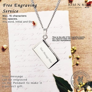May include: A silver necklace with a pendant that looks like a small book. The pendant has an inscription that reads "Your Message Here". The necklace is on a white background with text that reads "Free Engraving Service Max. 15 characters inc. spaces. Any word, initial and Etc..." and "Your message can be engraved on the Pendant to make it a perfect gift."