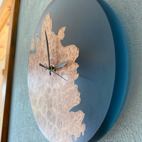 Epoxy resin and Burl wood clock, shops handmade with Australian Coolibah wood, one of a kind; a perfect gift for any occasion. Canadian made.