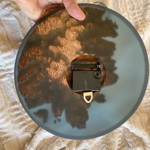 Epoxy resin and Burl wood clock, shops handmade with Australian Coolibah wood, one of a kind; a perfect gift for any occasion. Canadian made.