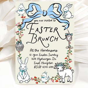 May include: A light blue and white Easter brunch invitation with a blue bow, a cupcake, a bunny, a lamb, and a bird. The invitation reads "you are invited to Easter Brunch at the Hendersons 12-4pm Easter Sunday 5678 Hydrangea Dr East Hampton. RSVP 12345 6789"