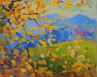 May include: An oil painting of a landscape featuring a vibrant display of autumn colors. Yellow leaves are scattered across the foreground, with blue mountains and green fields in the background. The artwork captures the essence of the season.