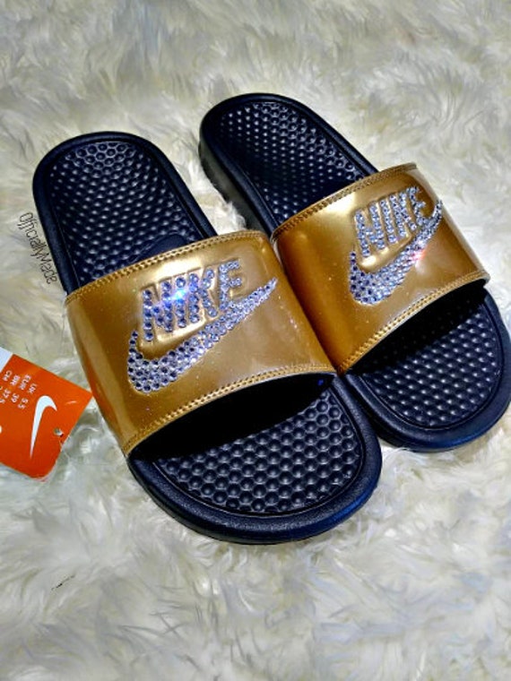 gold nike slides