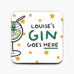 May include: White coaster with a green and blue illustration of a gin and tonic drink with a lime wedge and a sprig of rosemary. The text "Louise's Gin Goes Here" is written in black and green letters with yellow stars in the background.