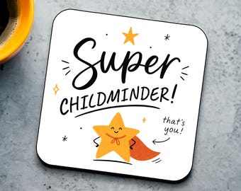 May include: White square coaster with the words "Super CHILDMINDER!" in black script. A smiling orange star with a red cape is featured below the text, with the words "that's you!" next to it. A yellow coffee mug is in the upper left corner.