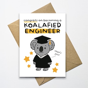 May include: A white card with a cartoon koala wearing a graduation cap and gown. The text on the card reads "Congrats on becoming a Koalafied Engineer. That's you!"