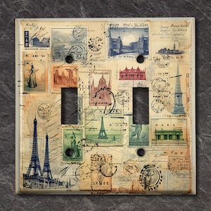 May include: A light switch cover with a vintage Parisian theme. The cover features a collage of images, including the Eiffel Tower, stamps, and other Parisian landmarks. The cover is made of durable plastic and is easy to install.