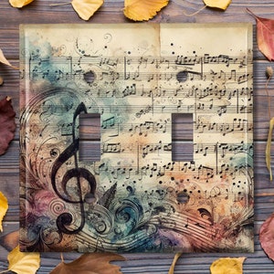 May include: A light switch cover with a vintage music sheet design. The sheet music features a treble clef, musical notes, and a watercolor background. The switch cover is made of durable plastic and is easy to install.