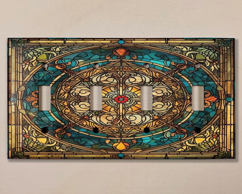 May include: A stained glass design light switch cover with a blue, green, yellow, and brown color scheme. The design features a circular pattern with a floral motif.