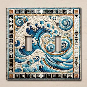 May include: A light switch cover with a mosaic design of blue and white waves with a geometric border. The waves are stylized and resemble a Japanese wave pattern.
