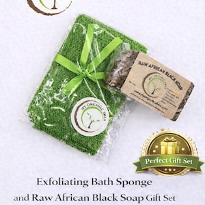 May include: A gift set featuring a green exfoliating bath sponge tied with a green ribbon and a bar of raw African black soap. The packaging includes the text "My Organic Shea" and "Raw African Black Soap". The set is labeled as a "Perfect Gift Set".