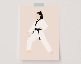 May include: A woman in a white martial arts uniform with a black belt stands in a fighting stance on a light pink background.