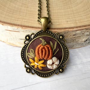 Hand Embroidered Pumpkin Necklace, Antique Bronze Cottagecore Fall Pendant Jewelry, Miniature Fiber Art, Cute Autumn Aesthetic Gift for Her image 1