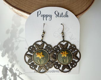 Daffodil Earrings, Hand Embroidered March Birth Flower Earrings, Yellow Daffodils on Sage green with Antique Bronze Filigree Settings