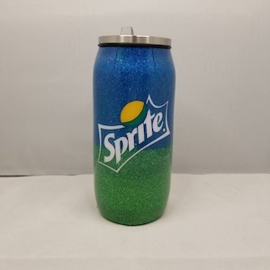 May include: A blue and green glitter tumbler with a Sprite logo. The tumbler has a stainless steel lid.