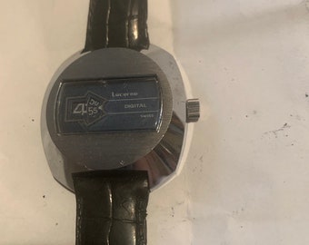 1970 Luzern Digitale Schweizer Direktablesung Sprung-Stunden-Aufzugsuhr . Sehr guter Zustand und Funktion einwandfrei