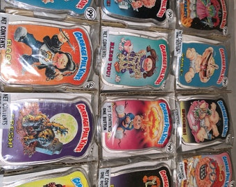 Full set of 12 mint sealed in packages Topps Garbage Pail Kids Buttons