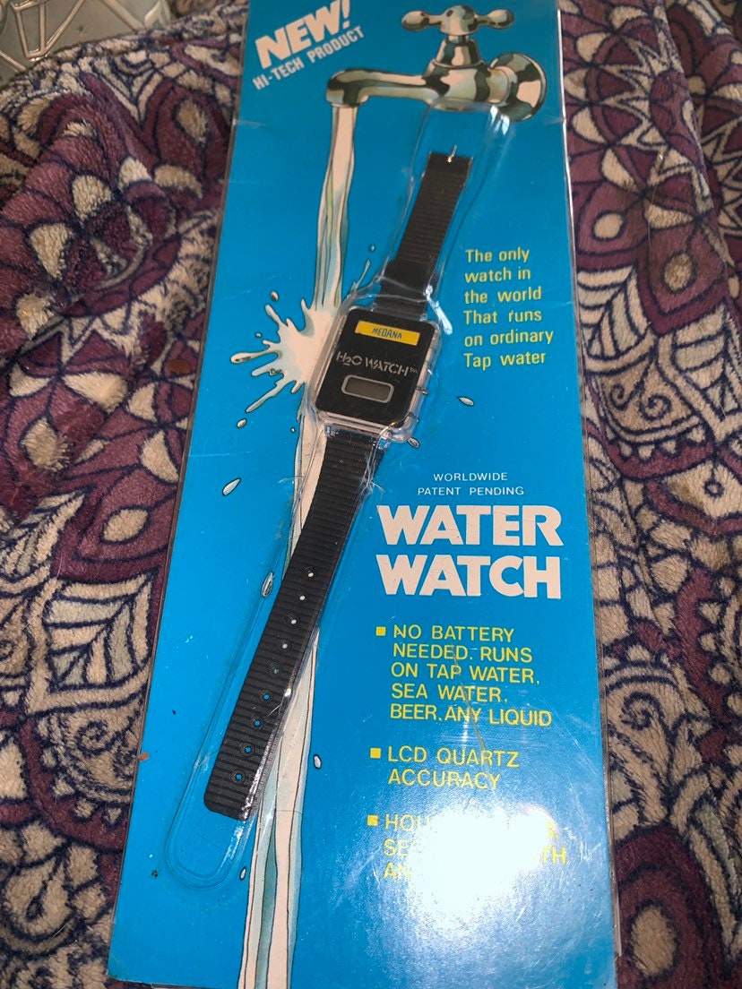 H2O WATER Watch Mint on Original Card From 1980s .unique LCD Watch
