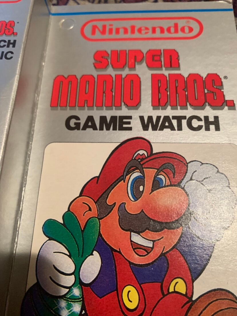 Nintendo Red Super Mario Bros Game Watch by Nelsonic Mint Unused