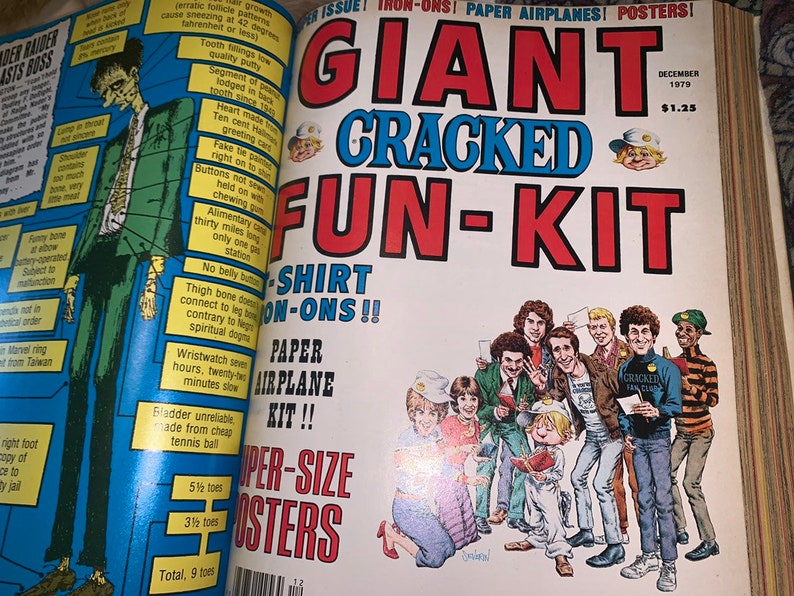 May include: A vintage magazine spread featuring the cover of "GIANT CRACKED FUN-KIT" from December 1979. The cover art includes a group of cartoon characters and the magazine's title in bold, colorful lettering. Inside, there are illustrations and text.