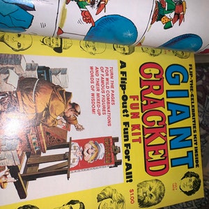 May include: A vintage "Giant Cracked Fun Kit" magazine from July 1978. The cover is yellow with the title in large, colorful letters. The magazine features illustrations and the text "A Flip-Out! Fun For All!"