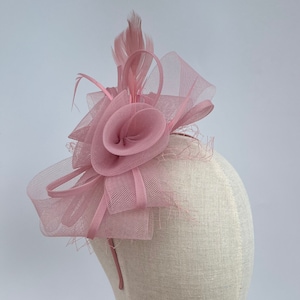 New blush pink headband and clip bow shape netted flower and feather fascinator