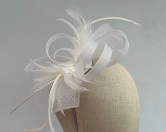 New white headband and clip mesh bow shape fascinator with added feathers