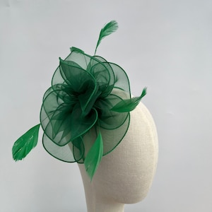 New Green fascinator with added feathers on changeable headband or clip